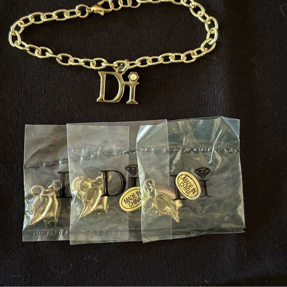 Diamond International Gold Charm Bracelet Set. 8 bracelets multiple charms. - Picture 11 of 15